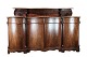 A late empire sideboard in mahogany with a curved front from the 1840s. Stands in very fine ...