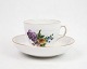 Coffee cup by 
Royal 
Copenhagen with 
saucer in the 
pattern light 
Saxon flower 
no. 493 / 1549. 
...