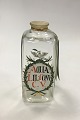 Holmegaard  
Pharmacy Jar 
with  the text 
AQUA LIL CONV 
C.V. from 1979.
Measures 21 cm 
/ 8.27 inch