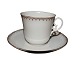Royal 
Copenhagen 
early white 
withgold edge, 
small demitasse 
coffeecup with 
matching 
saucer. It ...