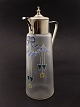 Wine jug glass 
with art 
nouveau enamel 
decorations H. 
30 cm. item no. 
488264 
Stock: 1