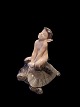 Royal 
Copenhagen 
Figurine of 
Faun on Turtle 
No 858. 
Measures 9.5 cm 
/ 3 47/64 in.