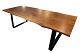 Oak plank table 
and black metal 
frame, made of 
2 solid planks 
with natural 
edges. The 
table is ...