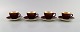 Four Royal 
Copenhagen / 
Aluminia 
Confetti mocha 
cups with 
saucers in 
glazed faience 
with ...
