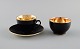 Royal 
Copenhagen / 
Aluminia 
Confetti mocha 
cup with saucer 
and sugar bowl 
in black glazed 
...