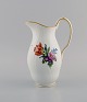 Royal 
Copenhagen 
Saxon Flower 
jug in 
hand-painted 
porcelain with 
flowers and 
gold 
decoration. ...