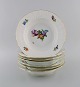 Royal 
Copenhagen 
Saxon Flower. 
Seven deep 
plates in 
hand-painted 
porcelain with 
flowers and 
gold ...