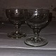 Pair of English 
wine glasses 
from around 
1840. Decorated 
with sanding 
around the 
basin. In ...