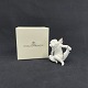 Height 6.5 cm.
Royal 
Copenhagen 
Christmas 
figure of an 
angel holding a 
shield with 
fine ...