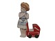 Royal 
Copenhagen 
miniature 
figurine, girl 
with red baby 
carriage.
Decoration 
number ...
