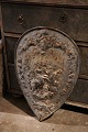 Decorative, old 
coat of arms 
with equestrian 
motif in cast 
iron with old 
gray paint and 
a super ...