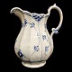 Royal 
Copenhagen, 
blue fluted 
half lace; A 
pitcher of 
porcelain #646. 
Second. H. 19,5 
cm. ...