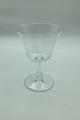 Wine glass with 
monogram on 
bell-shaped 
basin and 
hollow stem. 
Unknown origin. 
Presumed to 
have ...