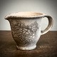 Mahler jug with 
white ash glaze 
H.13 cm. 
&#65533; 13/20 
cm cm. Appears 
with small chip 
on ...