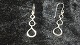 Elegant 
Earrings in 
Silver
Measures 40.04 
mm
Nice and well 
maintained 
condition