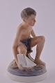 Boy with book, 
Dahl Jensen 
porcelain 
figurine. DJ  
Boy with seil 
boat, no. 1245. 
height  14.5 
...
