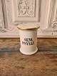 B&G Pharmacy 
jar in white 
porcelain with 
gold edge and 
black writing 
Produced 
between ...