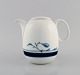 Bing & Grøndahl 
Corinth coffee 
pot. 1970s. 
Model number 
301.
Measures: 19 x 
15 cm.
In ...