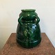Large 
earthenware 
vase from St. 
Erik's in 
Upsala with 
green glaze, 4 
handles and a 
relief motif 
...