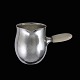 Georg Jensen. 
Hammered 
Sterling Silver 
Milk Jug #80A.
Ivory Handle.
Design by 
Georg Jensen 
...