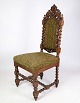 High-backed chair in solid oak with the style of the Renaissance from around the year ...