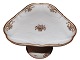 Royal 
Copenhagen Gold 
Basket with 
Ornaments and 
Small Flowers, 
triangular cake 
stand.
This ...