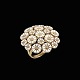 Bernhard Hertz. 
Gilded Sterling 
Silver Daisy 
Ring with 
Enamel.
Designed and 
crafted by 
Bernhard ...