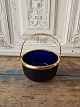 1800s sugar 
bowl in blue 
glass with 
brass mounting
Height 7.5 cm. 
Diameter 12 cm,