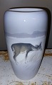 Porcelain vase 
with motif of 
deer in 
Dyrehaven in 
winter 
landscape. In 
good condition 
without ...