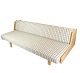 Hans J. Wegner's oak daybed / sofa is a unique design from around the 1960s. It is manufactured ...