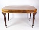 Mahogany dining table / desk with carvings on the legs from the Late Empire period from around ...