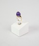 14K gold ring 
with amethyst 
in size 49, 
stamped 585. We 
have a jeweler 
who can resize 
if you are ...