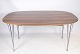 Dining table, 
designed by 
Piet Hein & 
Bruno Mathsson 
with rosewood 
veneer and 
steel legs ...
