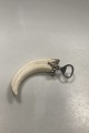Bottle Opener 
with Silver top 
mounting and 
wild boar tusk 
handle 
Measures 16cm 
/ 6.30 inch