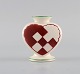 Rare Aluminia 
Christmas heart 
vase / 
candleholder in 
red faience.
Measures: 7.7 
x 7 cm.
In ...