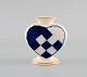 Aluminia 
Christmas heart 
vase / candle 
holder in blue 
faience.
Measures: 7.7 
x 7 cm.
In ...