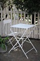 Old French square garden table in white painted iron with fine patina.H:73cm. 52x52cm. Can be ...
