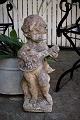 Old French sandstone figure with fine patina of little angel playing on lute. Height: 60cm.