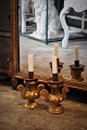 A pair of old 1800 century French gilded wooden candlesticks with candle holder in metal and ...
