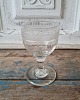 1800s wine 
glass with 
empire grinding 

Height 11 cm.