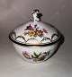 Saxon Flower 
porcelain sugar 
bowl with lid 
from Royal 
Copenhagen. 
Model number 
493 / 1678. In  
...