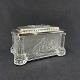Length 15.5 cm.
Width 9.5 cm.
Height 9 cm.
Nice box in 
pressed crystal 
glass with 
motifs on ...