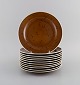 Stig Lindberg 
for 
Gustavsberg. 11 
Coq lunch 
plates in 
glazed 
stoneware. 
Beautiful glaze 
in brown ...