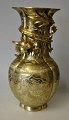Chinese bronze vase, 20th century. Top decorated with vicious dragon. Corpus richly decorated ...