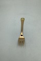Georg Jensen 
Annual Cake 
Fork 1985 in 
gilded Sterling 
Silver with 
enamel. 
Measures 13.5 
cm (5 ...