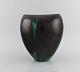 European studio 
ceramicist. 
Unique vase in 
glazed 
stoneware. 
Beautiful glaze 
in black and 
green ...