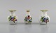 Three Herend porcelain vases with hand-painted flowers and butterflies. Mid-20th ...