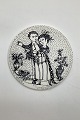 Monthly plate in faience for November "OPTIMISME" (contact). Designed by Bjørn Wiinblad for ...