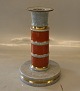 1 pieces in 
stock
212-3338 RC 
Grey 
candlestick 
with red and 
gold 18 cm 
Royal 
Copenhagen ...