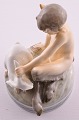Royal 
Copenhagen 
porcelain. 
Figurine Faun 
with rabbit. 
No. 439. Height 
14 cm. 5 1/2 
inches. 1. ...